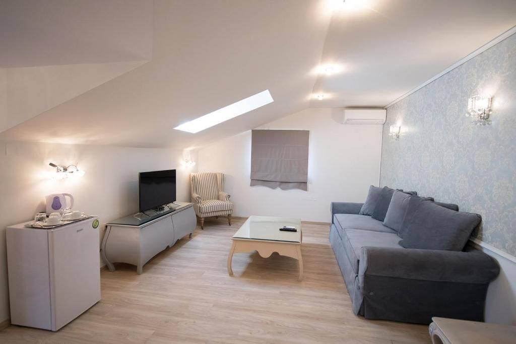 Superior-suite - udsigt til pool | Opholdsområde