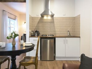 Fridge, microwave, toaster, cookware/dishes/utensils