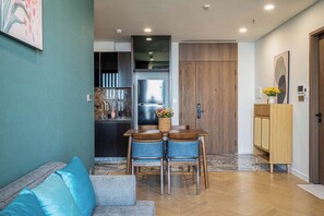 Deluxe Apartment, 1 Bedroom, Balcony, River View | Living area - LUMIÈRE Riverside Premier Residence (An Phu)