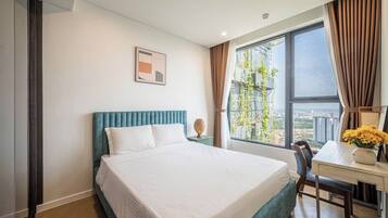 Deluxe Apartment, 1 Bedroom, Balcony, River View | Desk, laptop workspace, blackout curtains, soundproofing