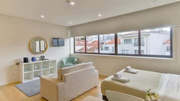 Monolocale Deluxe | Copriletto in piuma, Wi-Fi gratuito, lenzuola