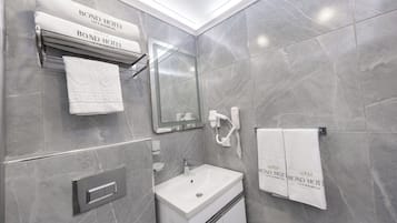 Basic Single Room | Bathroom | Shower, hair dryer, slippers, towels
