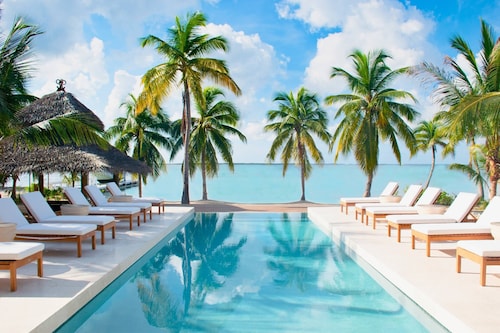 Koha Kai: Bali-Inspired Beach Villa w/Infinity Pool, Ocean Balcony + Bespoke Interiors