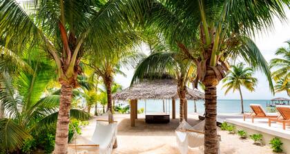 Koha Kai: Bali-Inspired Beach Villa w/Infinity Pool, Ocean Balcony + Bespoke Interiors