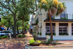 A street view with a building labeled "MEZCAL." - Summerwoods 1903 2 Bedroom Condo (Fernandina Beach)