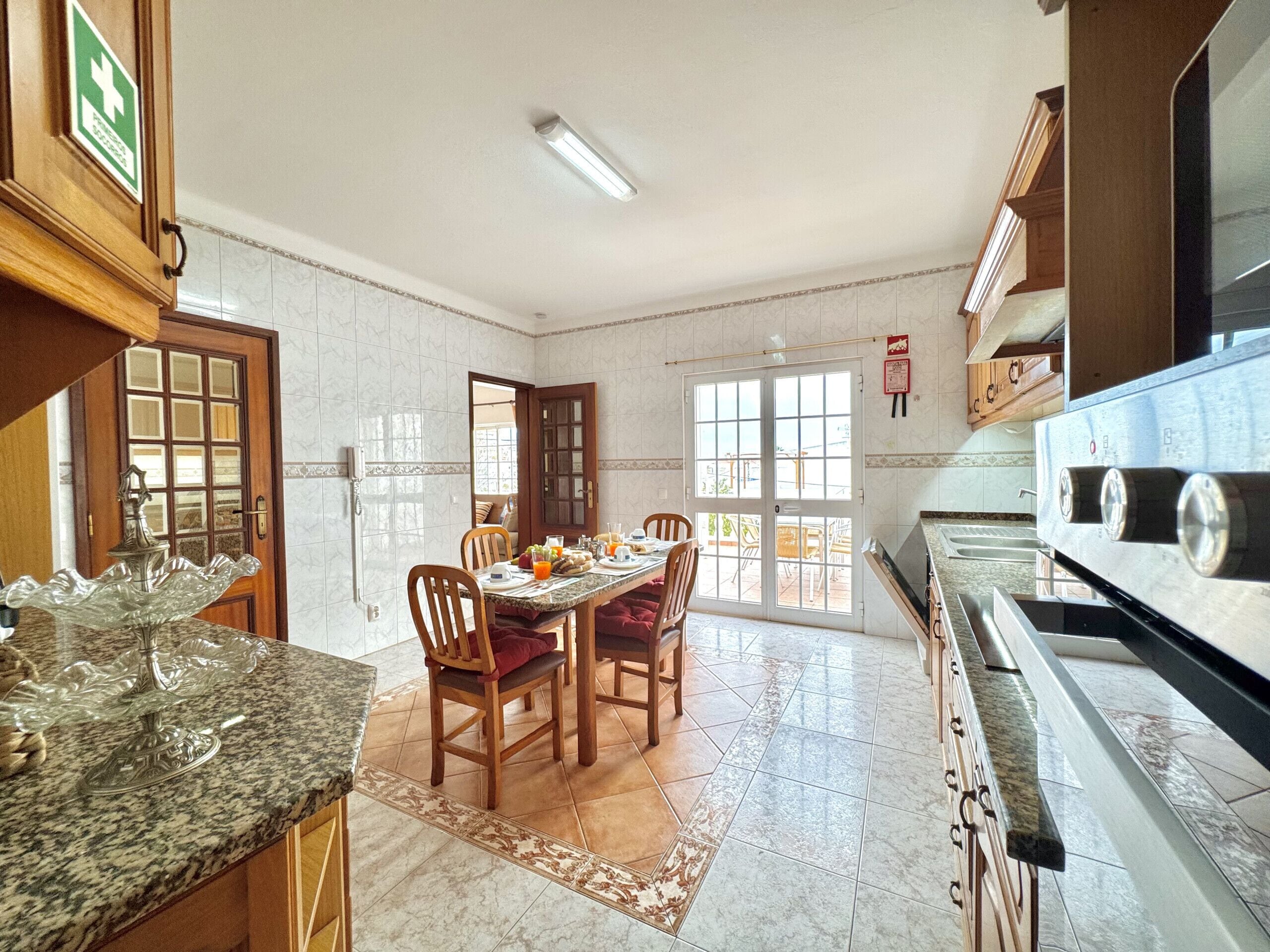 Microwave, dishwasher, coffee/tea maker, cookware/dishes/utensils