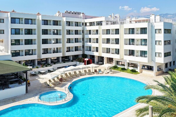 Seasonal outdoor pool, pool umbrellas, pool loungers