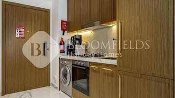 Apartamento, balcón, vistas a la ciudad | Cocina privada