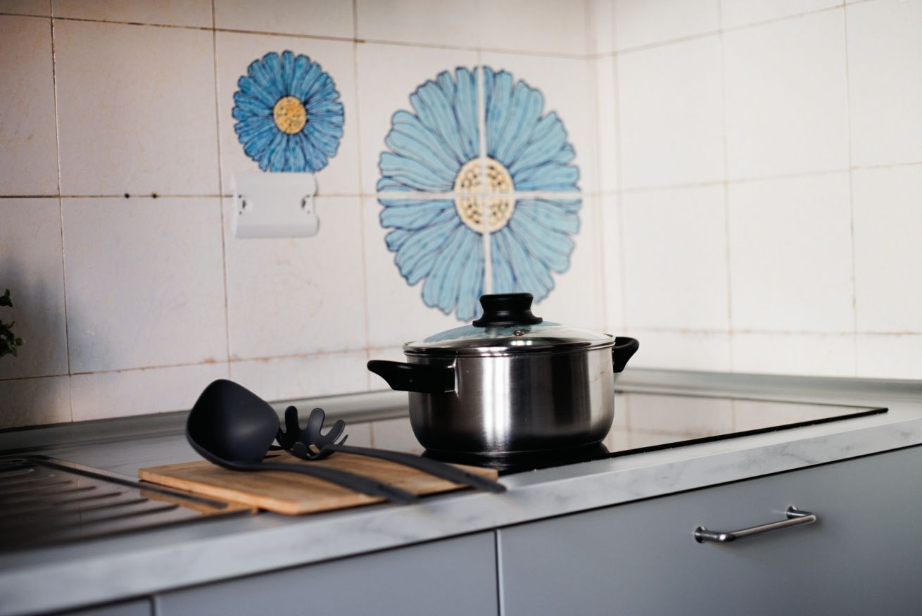 Fridge, stovetop, electric kettle, cookware/dishes/utensils