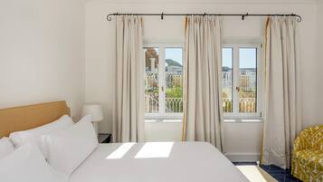 Egyptian cotton sheets, premium bedding, down duvets, memory-foam beds
