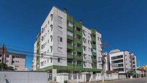 A multi-story residential building with balconies and a gated entrance. - Apt in Condo w/ Pool 350m From the Beach Pvj0021 (Ubatuba)