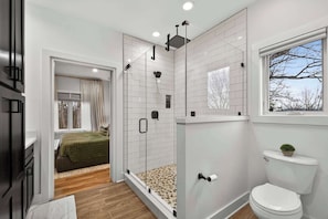 Shower, hair dryer, towels, shampoo