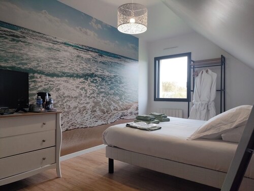 Room with bathtub and unlimited access to an outdoor spa.