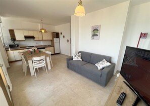 Apartment, 3 Bedrooms, Balcony, Ocean View | Living room - Apartment With sea View in Lignano (Lignano Sabbiadoro)