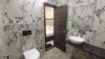 Shower, towels, soap, shampoo