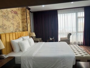 Ropa de cama de alta calidad, edredón, camas con pillow-top y minibar 