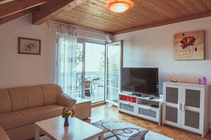 Comfort Apartment, 2 Bedrooms, Balcony, Mountain View | Living area | Flat-screen TV, DVD player - ArmoniaHomes Armonia Altach -2BR Apt (Altach)