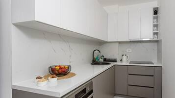 Appartement Deluxe, balcon, vue ville | Cuisine privée