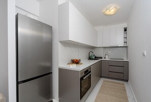 Deluxe Apartment, Balcony, City View | Private kitchen - Alpha Mare (Bar)