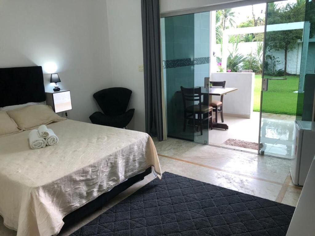 Deluxe Double Room, Lanai, Garden View | Iron/ironing board, free WiFi