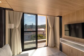 Luxury Apartment | Living area | 43-inch Smart TV with digital channels, streaming services