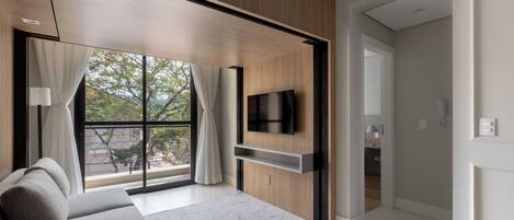 Classic Apartment | Living area | 43-inch Smart TV with digital channels, streaming services