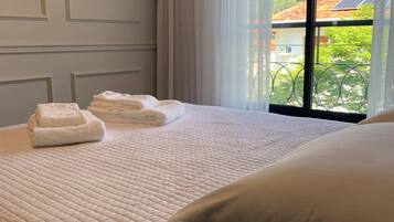 Luxury Apartment | Individually decorated, blackout drapes, iron/ironing board, free WiFi