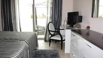 Apartment, Balcony, Courtyard View | In-room safe, iron/ironing board, free WiFi