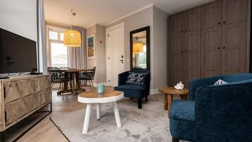 32-inch flat-screen TV with cable channels