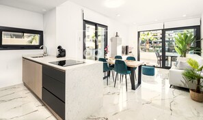 Fridge, microwave, oven, stovetop - Orihuela Poolside Retreat, High-end apt, Pool views - by OYOOSTAYS (Orihuela)