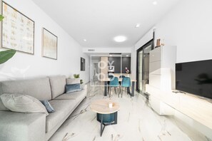 TV - Orihuela Poolside Retreat, High-end apt, Pool views - by OYOOSTAYS (Orihuela)