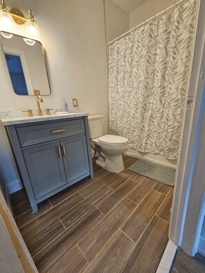 Shower, bidet, towels, soap