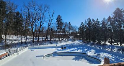 Amazing 6 bedroom home featuring a wraparound deck & private pool