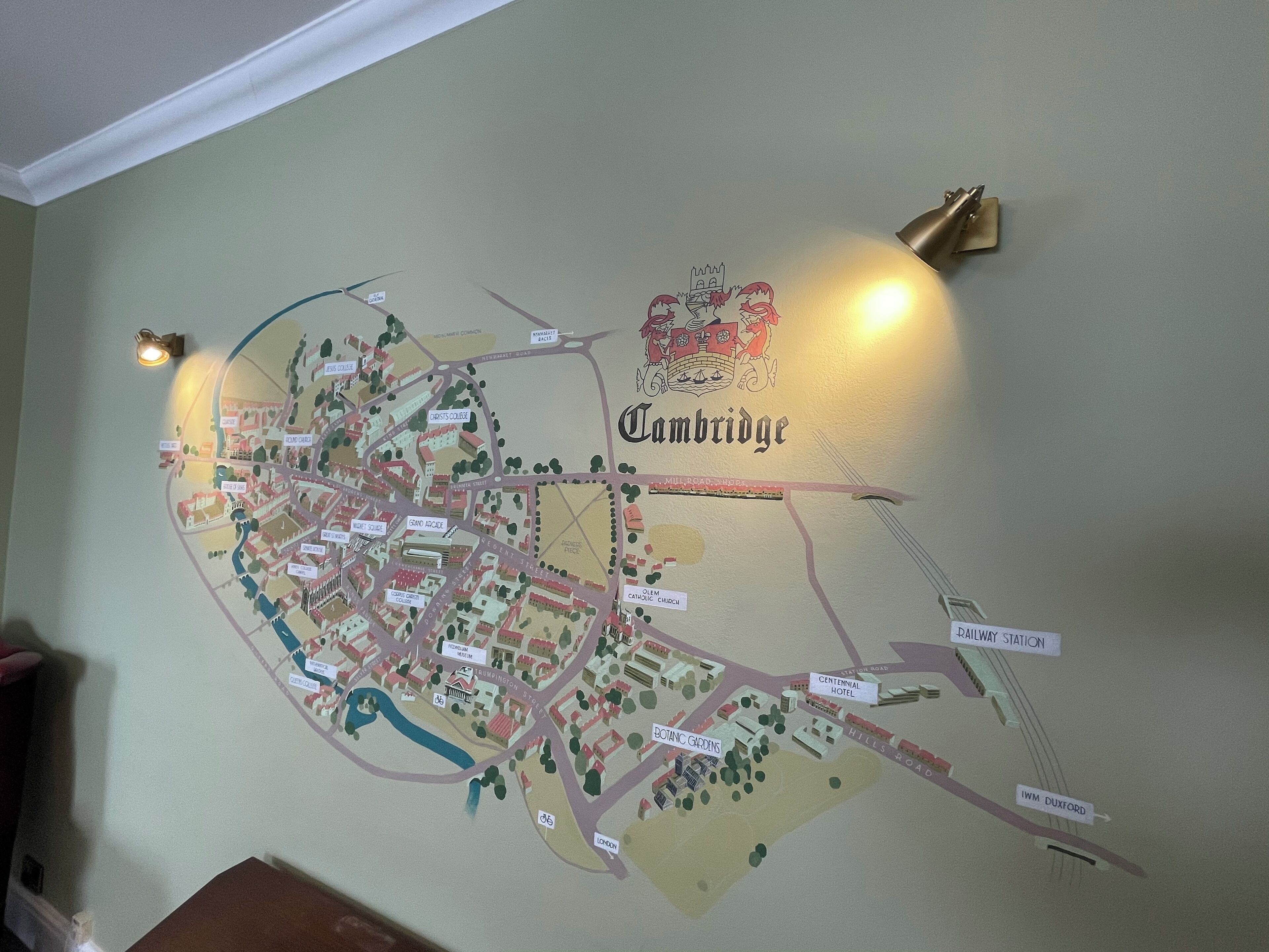 A detailed map of Cambridge with labeled streets, landmarks, and a railway station.