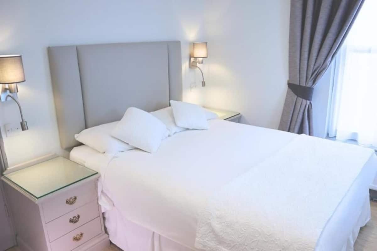 In-room safe, desk, blackout curtains, iron/ironing board