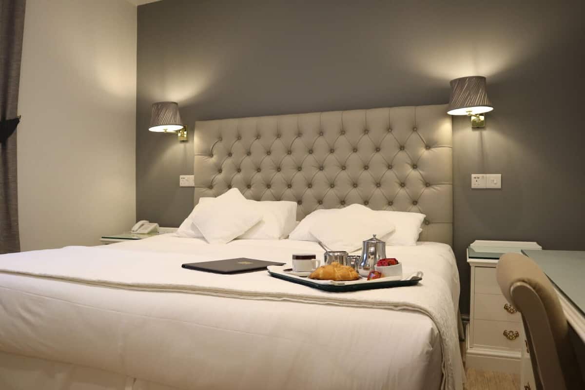 In-room safe, desk, blackout curtains, iron/ironing board