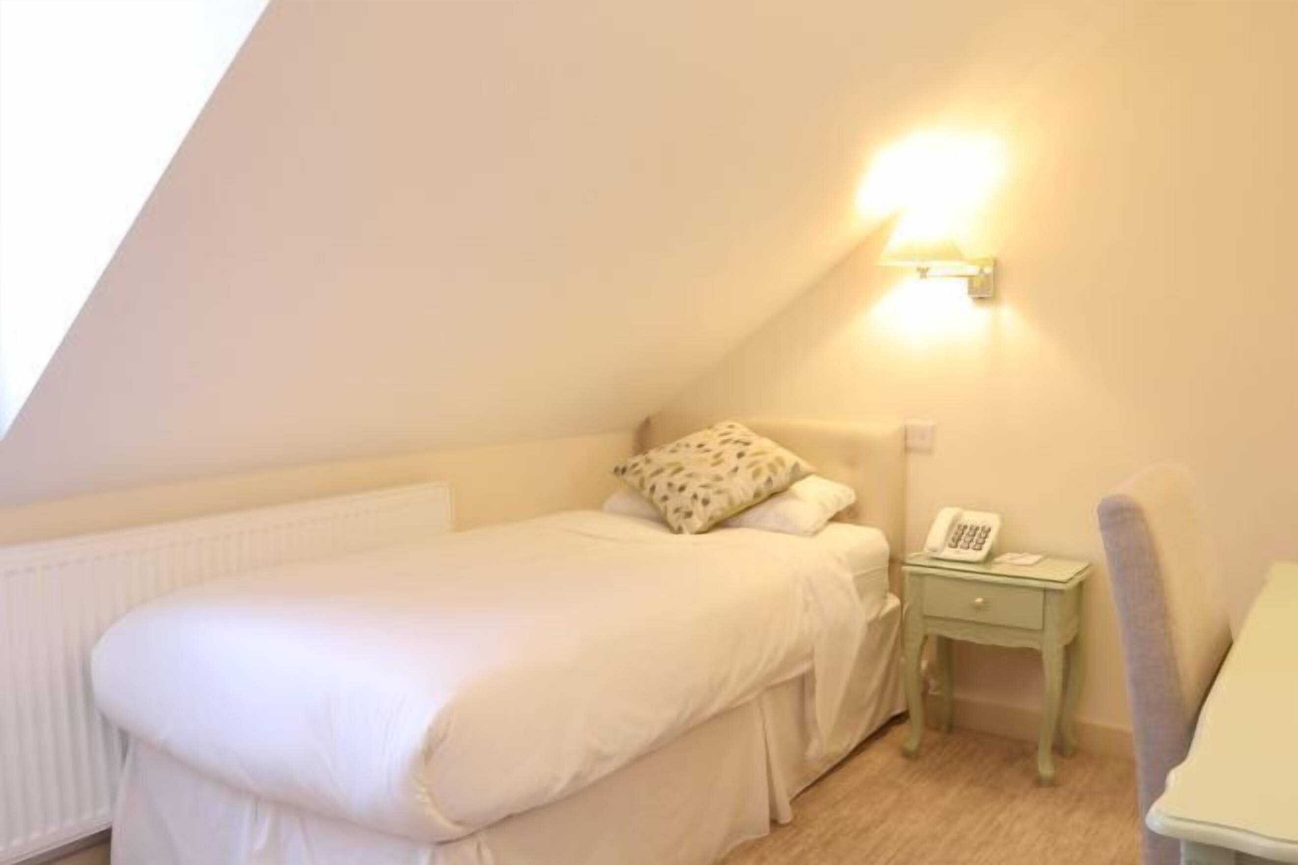 Hypo-allergenic bedding, in-room safe, desk, laptop workspace