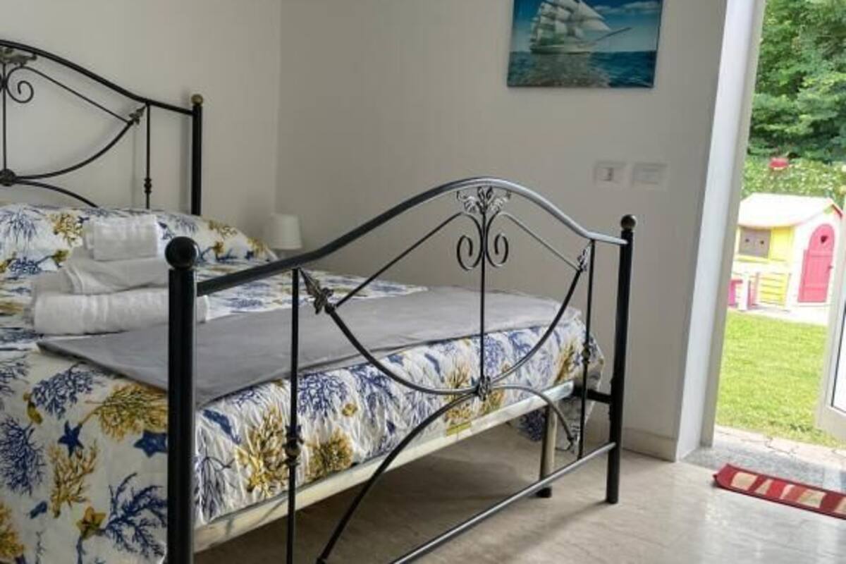 Family Quadruple Room, Garden View | Desk, blackout drapes, iron/ironing board, free WiFi