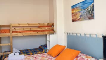 Family Quadruple Room, Courtyard View | Desk, blackout drapes, iron/ironing board, free WiFi