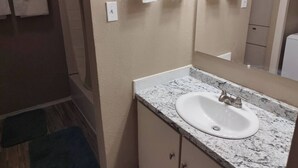 Shower, hair dryer, towels, soap - Cozy & Quant: Spacious 4-bedroom townhome in delightful Fort Worth. (Fort Worth)