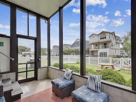 Outdoor dining. 4BR Home Near the Beach! | Canal Access + Porch