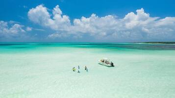 Free beach shuttle, sun loungers, beach towels