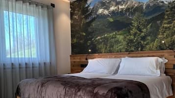 Deluxe Triple Room, Patio, Garden View