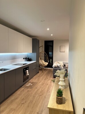 Apartment, 1 Bedroom, Patio, Garden View | Living room | Books - City Condo Central Manchester Spacious Apartment Local Attractions Gym Parking (Manchester)