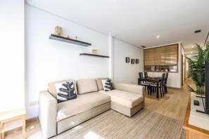 Deluxe appartement, uitzicht op de stad | Woonruimte