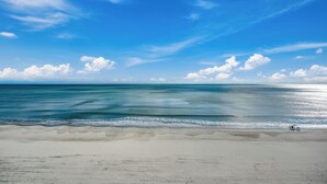 A beach with a clear sky and calm sea. - 🌟Oceanfront~Awesome Amenities~ Sands Beach Club 722🌟 (Myrtle Beach)