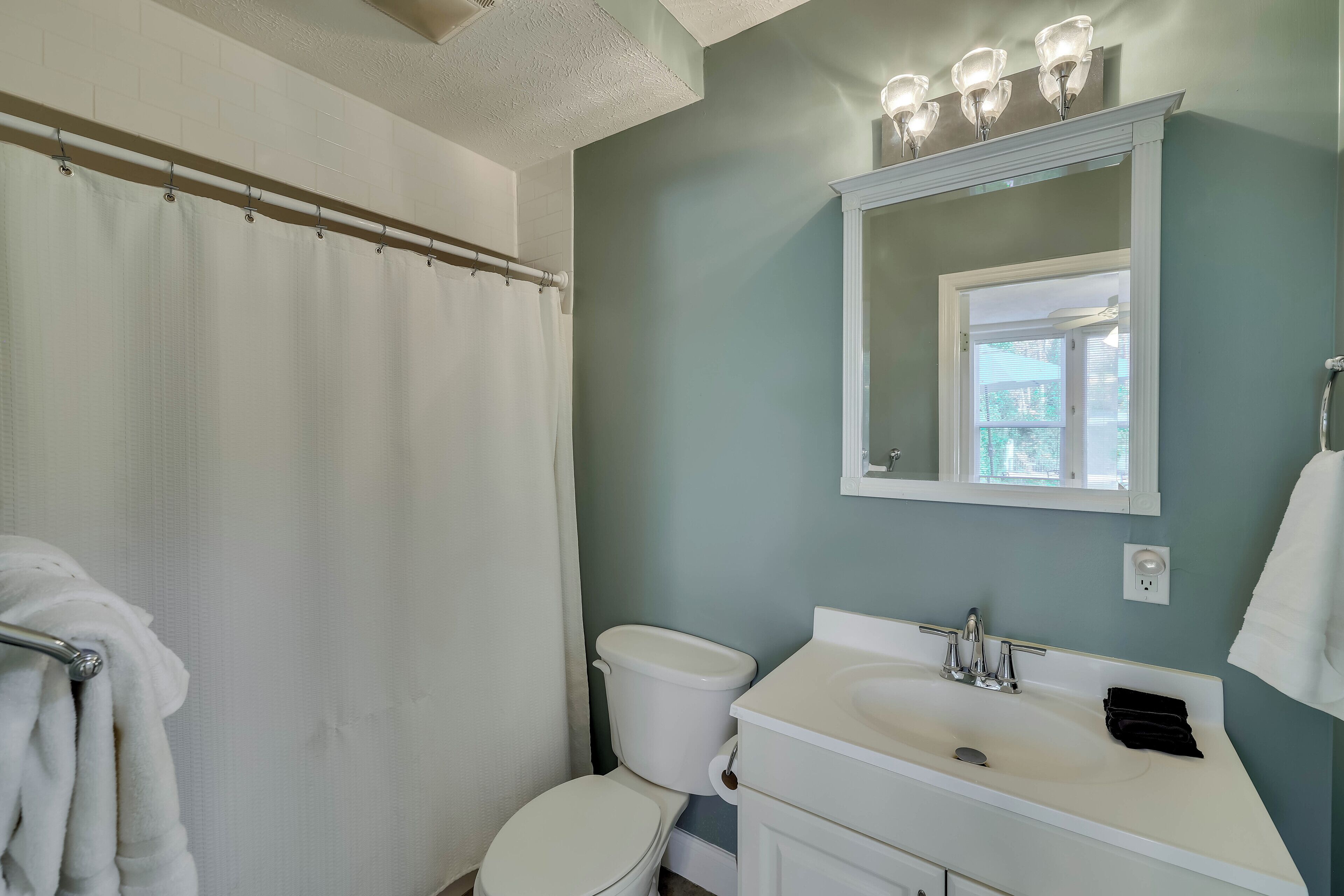 Hair dryer, towels, soap, toilet paper