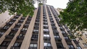 A high-rise building with multiple floors, each featuring a balcony with a metal railing. - Cozy apartment in a modern building in the heart of Rio, accommodates up to 6 people. (Rio de Janeiro)