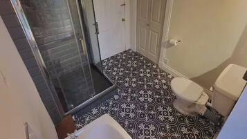 Shower, free toiletries, hair dryer, towels