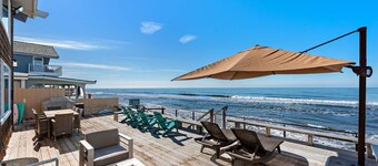 Oceanfront Home with Expansive Deck, Private Steps to the Sand STR24-0038